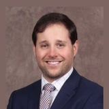 The "Daniel E. Kaplan" user's logo