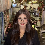 The "Ema Gomez" user's logo