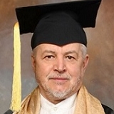 The "Rt Hon. Lord Dr. sci. dr. Gyula Julius Reznicsek Nat. Med. Eng. Med." user's logo