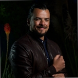The "Juan Becerra" user's logo