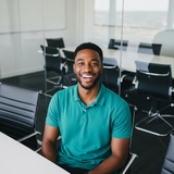 The "Malik Thompson" user's logo