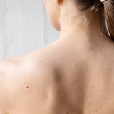 The "How to Treat Back Acne and Its Effects?" user's logo