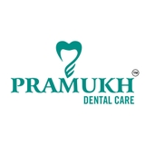 The "Pramukh Dental Care" user's logo