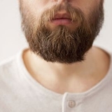 The "Beard Hair Transplant in Riyadh" user's logo