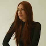 The "thayna drummond" user's logo