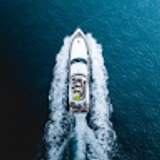 The "glamouryacht" user's logo