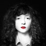The "Laure Laspatzis" user's logo