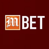The "mbetukcom" user's logo