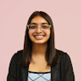 The "Riya Sharma" user's logo