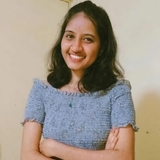 The "Vrushali Gawas" user's logo